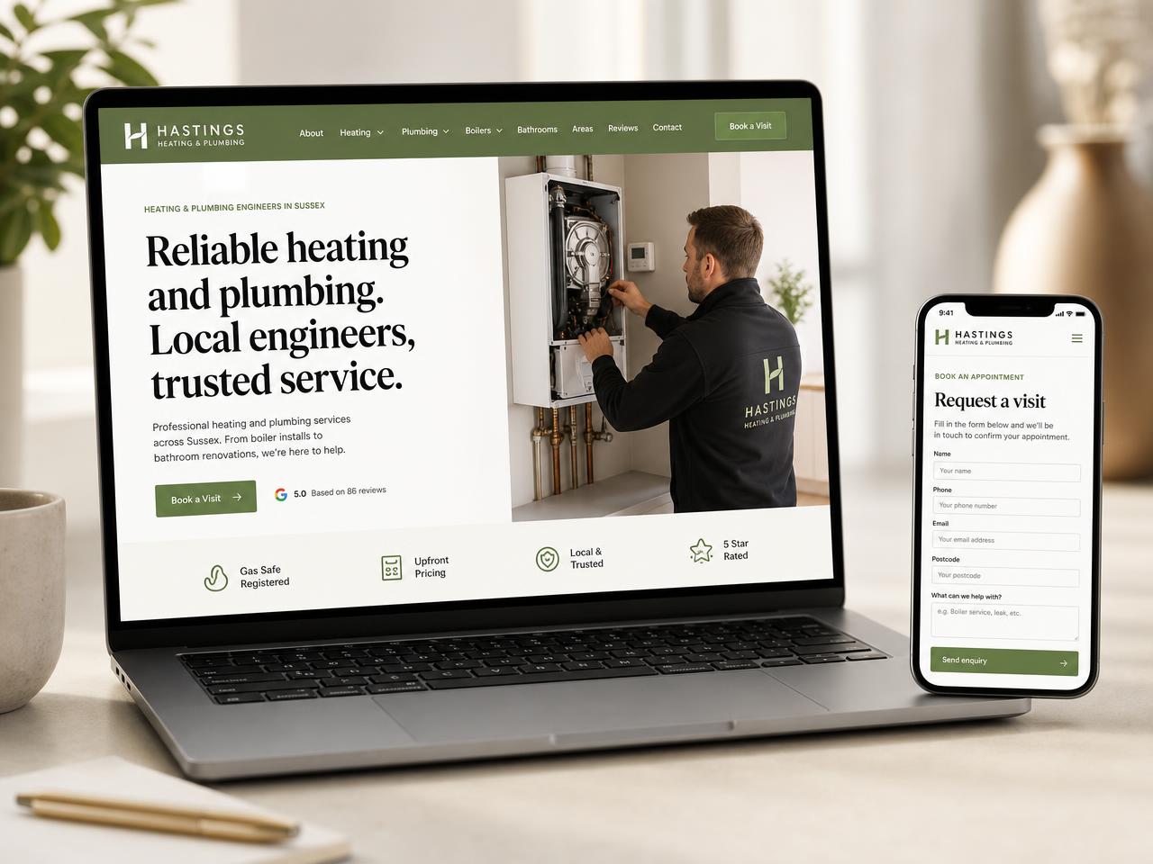 Heating engineer's website homepage shown on a laptop with booking form and service pages